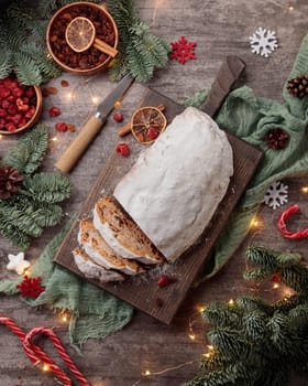 Traditional christmas Shtollen cake on a gray background