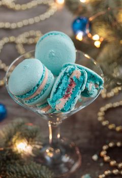 Sweet dessert - blue christmas macaroons on a gray background
