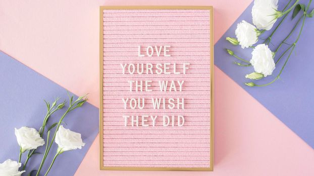 pink motivational text board view