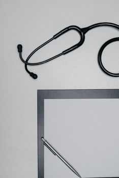 Medical stethoscope. Black medical stethoscope.The concept of healthcare.Stethoscope on a white background