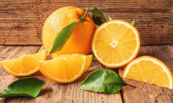 Fresh oranges on wooden background.selectiv focus.nature