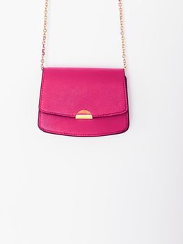 Pink fashionable leather purse with gold details as designer bag and stylish accessory, female fashion and luxury style handbag collection concept