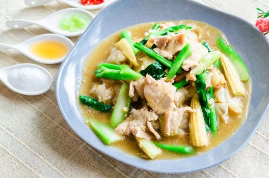 The Homemade Stir-Fried Noodles with Gravy Sauce on table. (Thai food)