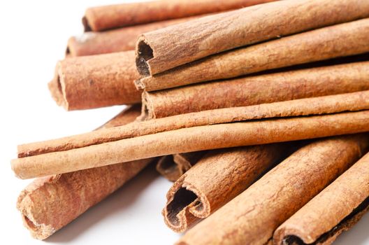 The Group of cinnamon sticks on white background