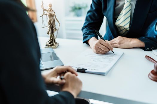 Law, Consultation, Agreement, Contract, Attorney or Lawyer holding a pen is consulting with a client to explain the pattern of answering questions before going to court to decide a lawsuit