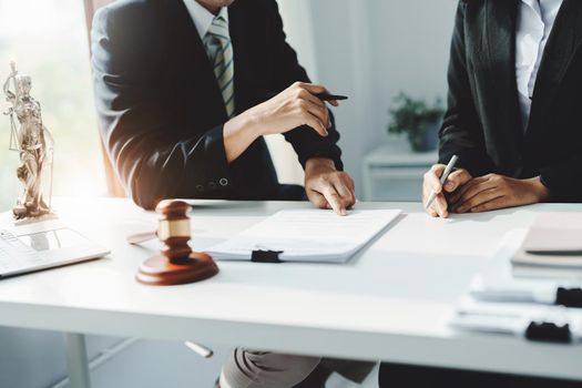 Law, Consultation, Agreement, Contract, Attorney or Lawyer holding a pen is consulting with a client to explain the pattern of answering questions before going to court to decide a lawsuit