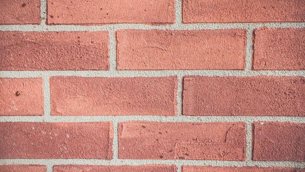 The background of the orange brick wall. Antique weathered wall Grunge background The backdrop, interior design