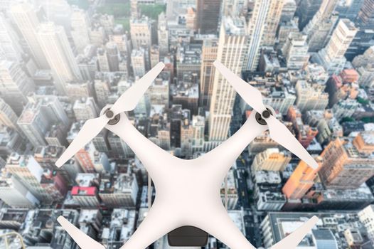 Drone with digital camera flying over a big city in sunlight: 3D rendering