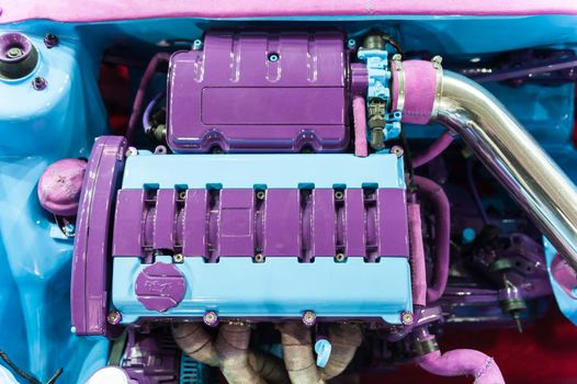 Closeup on purple and blue engine