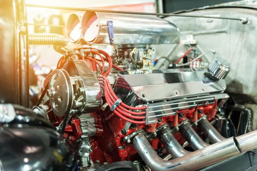 Engine of a hot rod in the sunlight