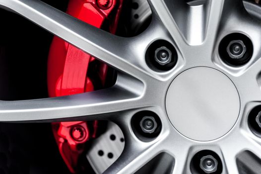 Close up of a modern sport wheel with red brake