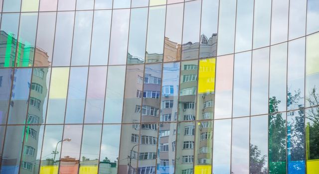 window reflections at the glass facade of an office building