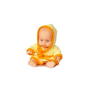 A toy child in a bright robe. Doll on a white isolated background. Toy for children, dolls