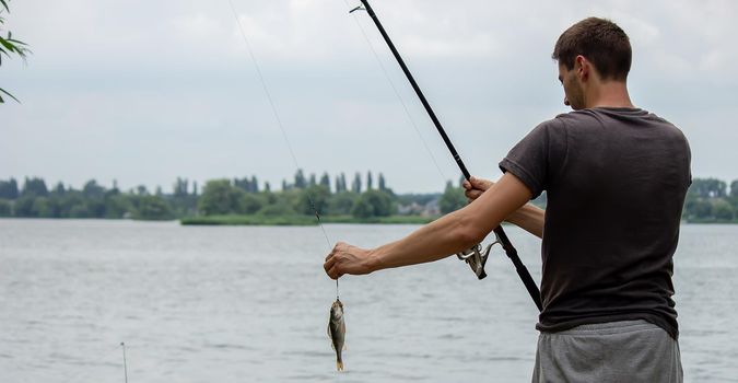 Fishing. Fish on a hook. Selective focus Nature