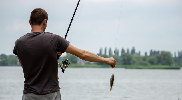 Fishing. Fish on a hook. Selective focus Nature