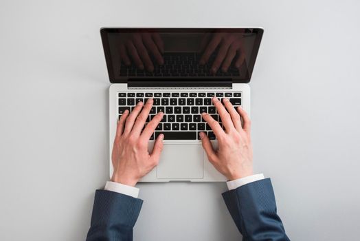 top view laptop with hands