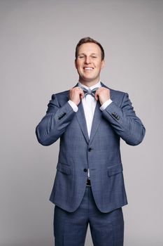 Portrait of handsome man in black suit. handsome man