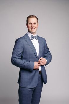 Portrait of handsome man in black suit. handsome man