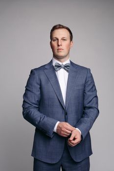 Portrait of handsome man in black suit. handsome man