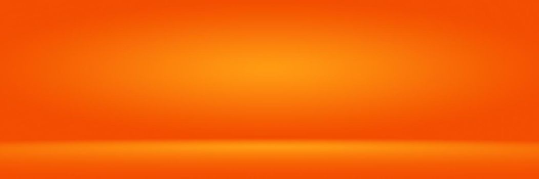 Orange photographic studio background vertical with soft vignette. Soft gradient background. Painted canvas studio backdrop