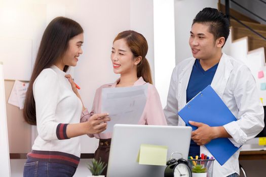 Business Team brainstorm meeting. Group of business people working at Private Home Office.Young business people working with laptop .Asian teamwork business people share idea with team at office