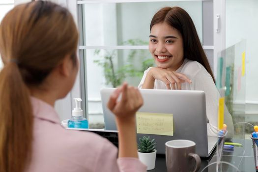 Asian Business Team brainstorm meeting. Business start up working at Private Home Office. New generation business people working New business development, Startup concept. Women relex afer work