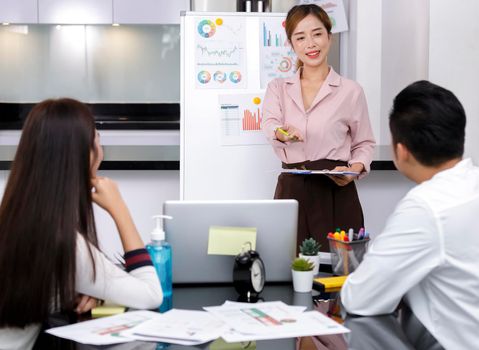 Asian Business Team brainstorm meeting. Business start up working at Private Home Office. New generation business people working New business development, Startup concept.