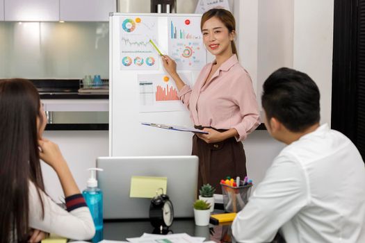 Asian Business Team brainstorm meeting. Business start up working at Private Home Office. New generation business people working New business development, Startup concept.