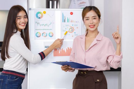 Asian Business Team brainstorm meeting. Business start up working at Private Home Office. New generation business people working New business development, Startup concept.