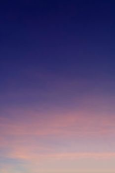 Beautiful morning clear sky background. Colorful yellow blue sky. Morning colorful clear blue sky background with soft white clouds sunrise or sunset.