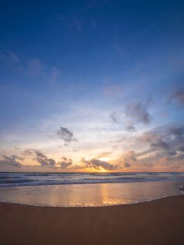 Beautiful tropical beach with blue sky abstract texture background. Copy space of summer vacation and holiday business travel concept. Vertical photo