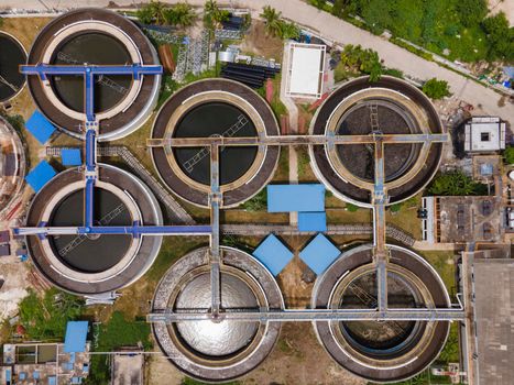 Aerial Drone view move up from clarifier sedimentation tank. Aerial view Water treatment plant.
