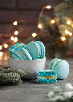 Sweet dessert - blue christmas macaroons on a gray background