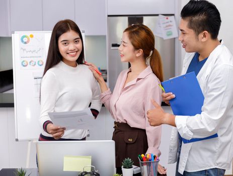 Business Team brainstorm meeting. Group of business people working at Private Home Office.Young business people working with laptop .Asian teamwork business people successful celebrate