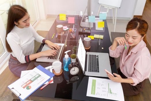 Asian Business Team brainstorm meeting. Business start up working at Private Home Office. New generation business people working New business development, Startup concept.