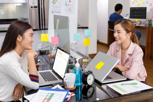 Asian Business Team brainstorm meeting. Business start up working at Private Home Office. New generation business people working New business development, Startup concept. Women relex afer work