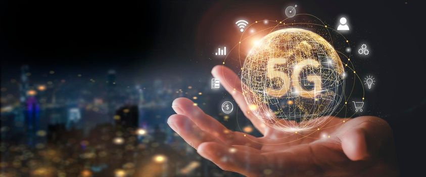 Hand business man show global network connection 5G. Global network connection 5G with icon concept Technology network wireless systems and internet of things, new technologies coming up in the future