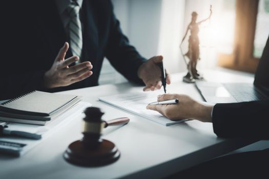 Law, Consultation, Agreement, Contract, Attorney or Lawyer holding a pen is consulting with a client to explain the pattern of answering questions before going to court to decide a lawsuit