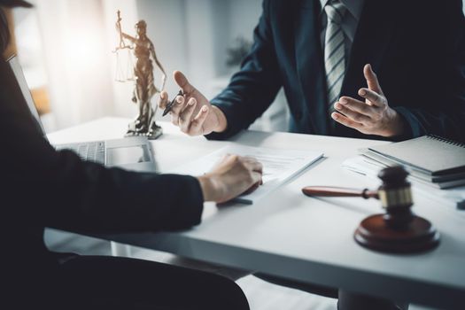 Law, Consultation, Agreement, Contract, Attorney or Lawyer holding a pen is consulting with a client to explain the pattern of answering questions before going to court to decide a lawsuit