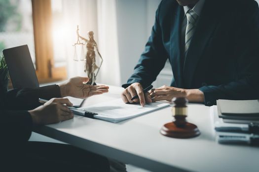 Law, Consultation, Agreement, Contract, Attorney or Lawyer holding a pen is consulting with a client to explain the pattern of answering questions before going to court to decide a lawsuit