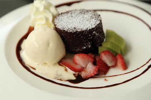 Chocolate Lava Cake with ice cream in cafe