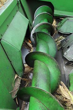 Metal screw conveyor helix on harvest car