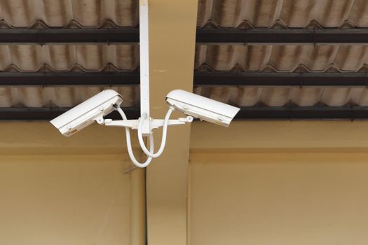 Security Camera or CCTV with roof background