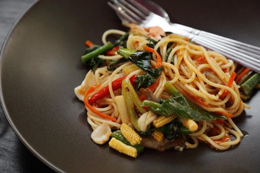 Italian pasta - spaghetti bolognese in plate, at restaurant