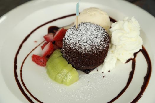 Chocolate Lava Cake with ice cream in cafe