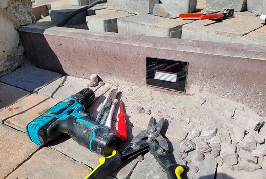 installation of the lamp in a concrete curb. Selective focus