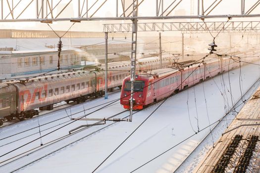 MOSCOW, RUSSIA - January 01, 2010. Upper view on Aeroexpress moving to Vnukovo airport past Studencheskaya subway station of Moscow underground before renovation.