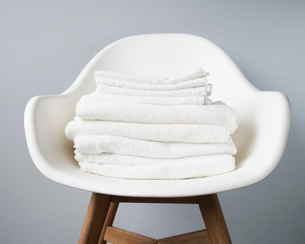 front view pile towels chair