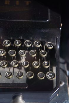 Old iron german typewriter in a museum. Close-up