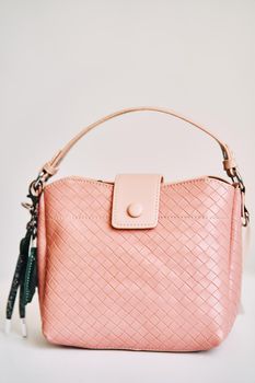 Pink women bag on sale in store. High quality photo